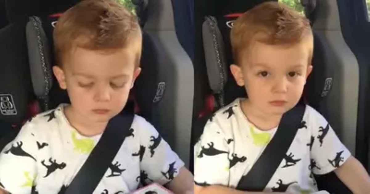 Two side-by-side images of a young boy with light brown hair in a car seat, wearing a white shirt with dinosaur prints. In the left frame, he looks down, possibly at something in his lap, and in the right frame, he looks directly at the camera with a neutral expression.