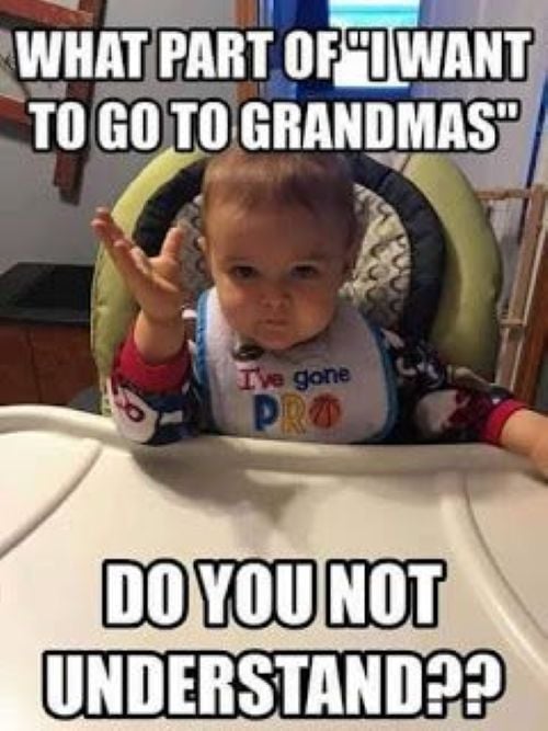 Baby in a high chair raising a hand with text demanding to go to grandma’s house.