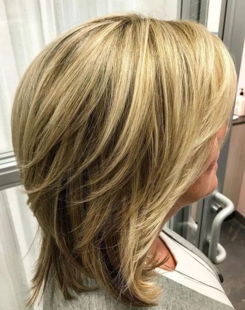 Medium Blonde Balayage Hairstyle with Dynamic Layers