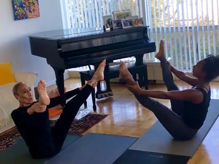 Aliya and Millie in Millie's living room, when she was 88 years old. This is where they would often stretch.
