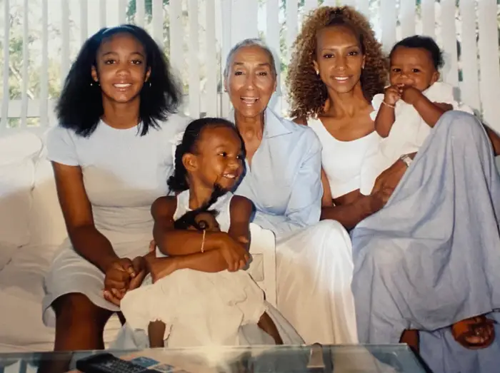 Aliya, her sister Carley as a baby, her cousin, Shanna, her mom, Liza, and Millie pictured in Millie's home.
