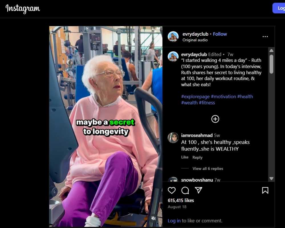 Elderly woman in a pink sweatshirt exercising on a leg press machine at the gym, with text overlay: “maybe a secret to longevity.”
